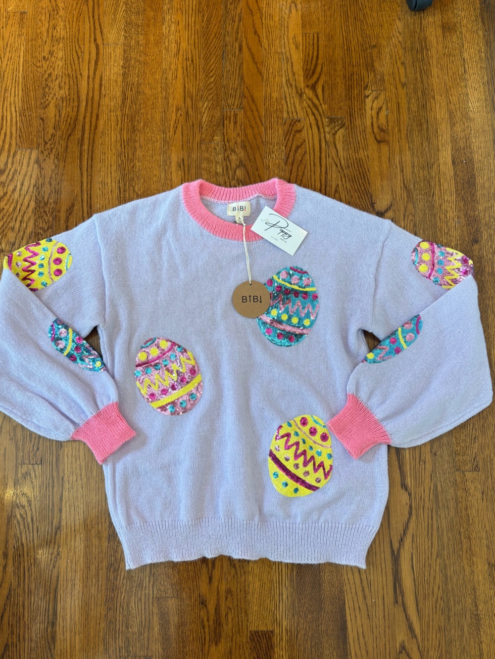 BiBi Lavender Easter Egg Sweater with Pink Trim and Colorful Sequins